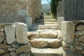 1024px-Remnants of Apollon temple, Zoodochos Pigi na Anafi, 176381.jpg