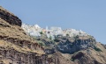 Fira and crater rim seen from the caldera - Santorini - Greece - 05.jpg