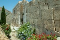 1024px-Gate to Moni Zoodochos Pigi, Christian rebuilding of entrance to shrine Apollo sanctuary, Anafi, 176287.jpg